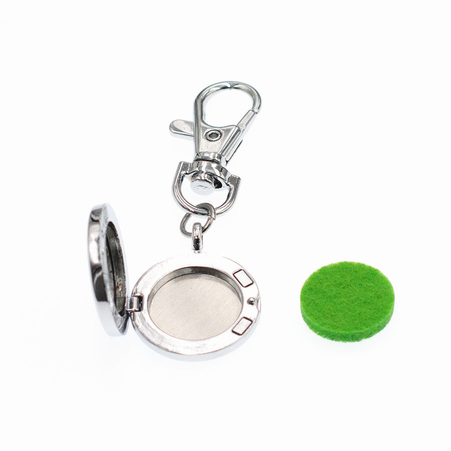 Wholesale Alloy Angel Wings Hollow Aromatherapy Essential Oil Keychain